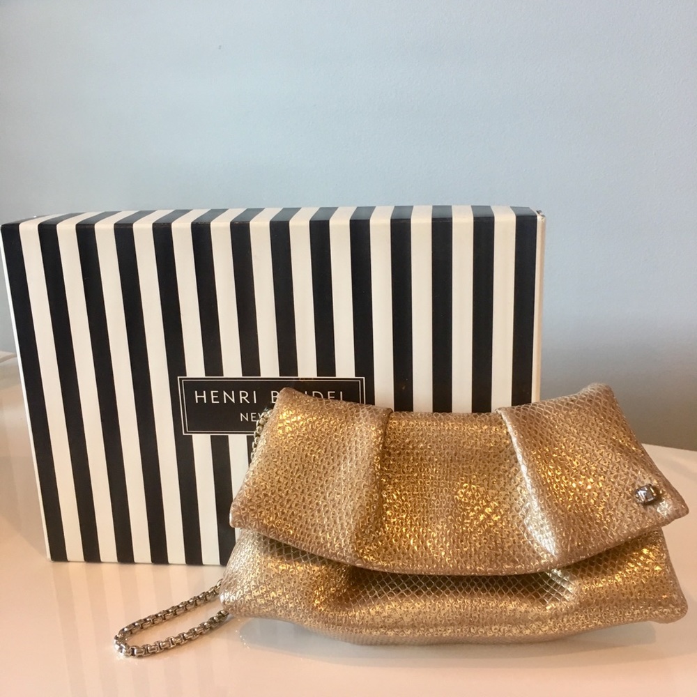 Henri Bendel gold clutch